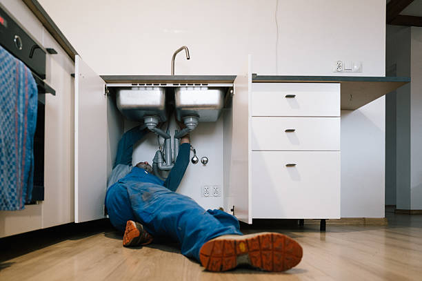 Professional Emergency Plumber technician working in Camden, TN